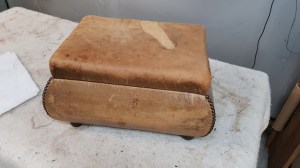 Leather footstool - before